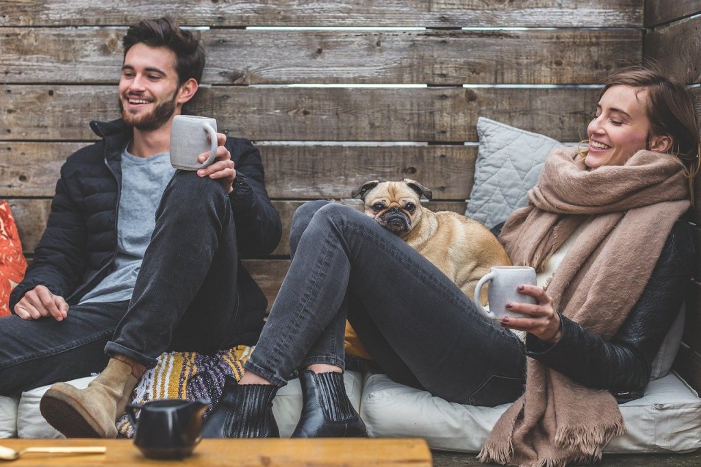 a couple with a dog